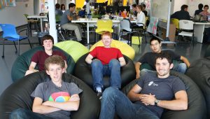Mantis team sitting in bean bag chairs at the SLO HotHouse