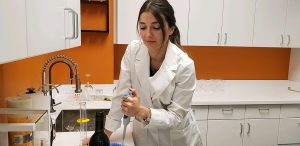 Katerina Axelsson, CEO and founder of Tastry, in the lab testing wine.